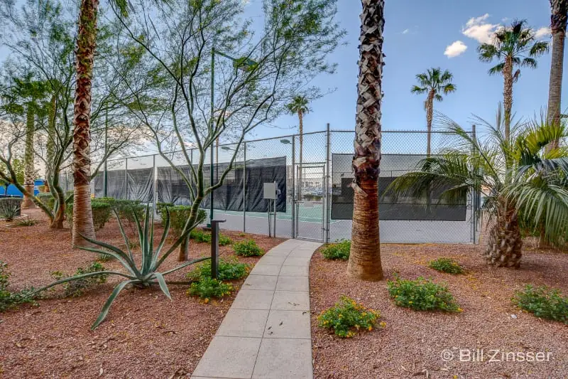 One Las Vegas Tennis Courts surrounded by palm trees